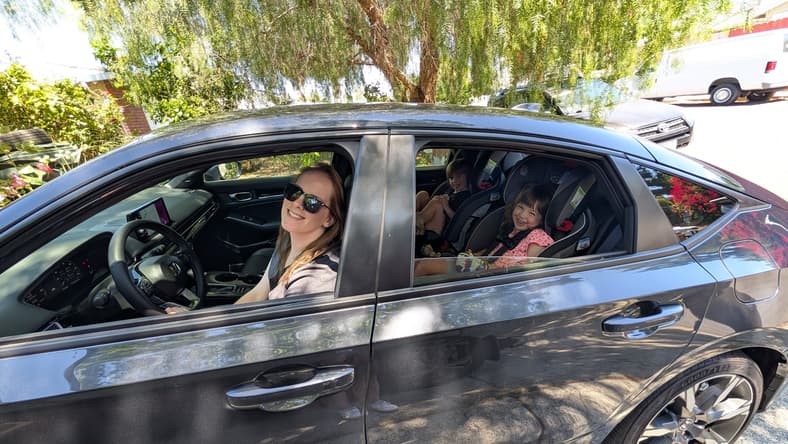 My Daughters And I Sitting In The 2026 Honda Civic Hatchback Hybrid