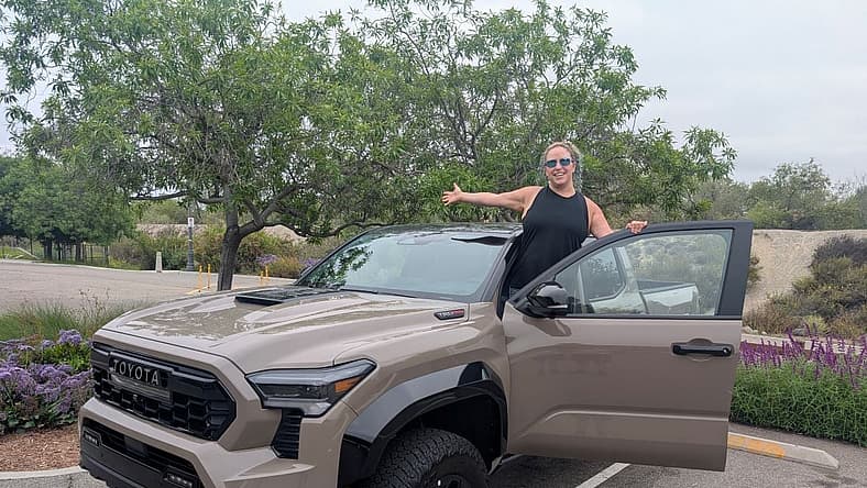 Liv Standing With The 2025 Toyota Tacoma Trailhunter Double Cab