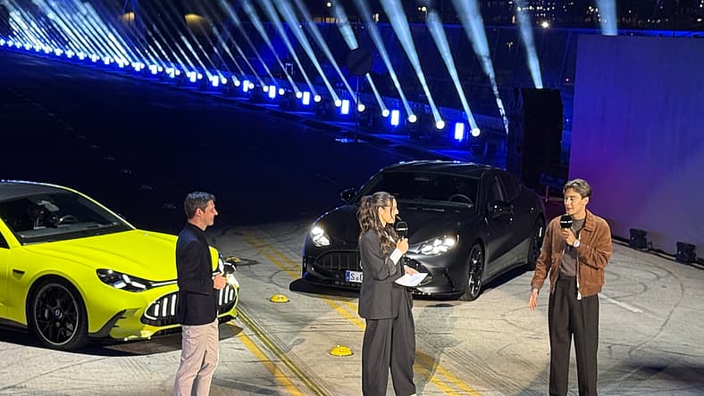 Michael Schiebe Of Amg And George Russell, F1 Driver, Introducing The Mercedes-Amg Gt 4-Door Coupe