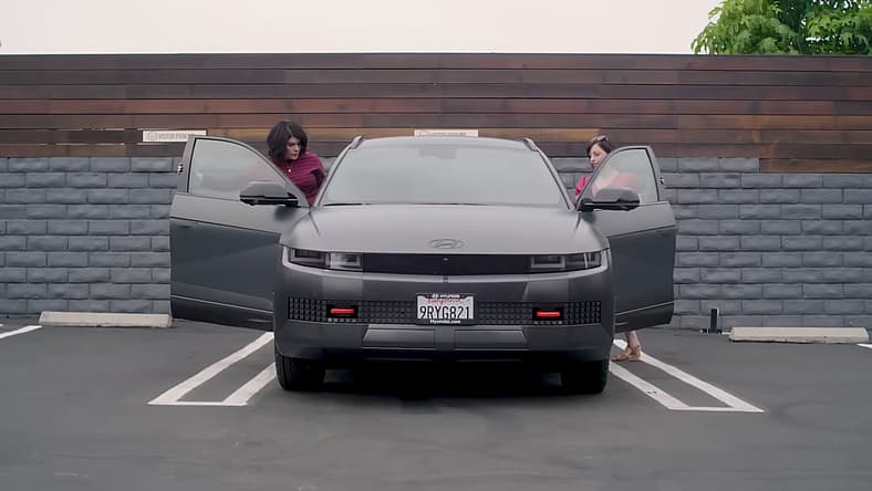 My Favorite Murder Partners with Hyundai for a Honking Good Time 19 Karen And Georgia Hopping Into The Hyundai Ioniq 4 Xrt