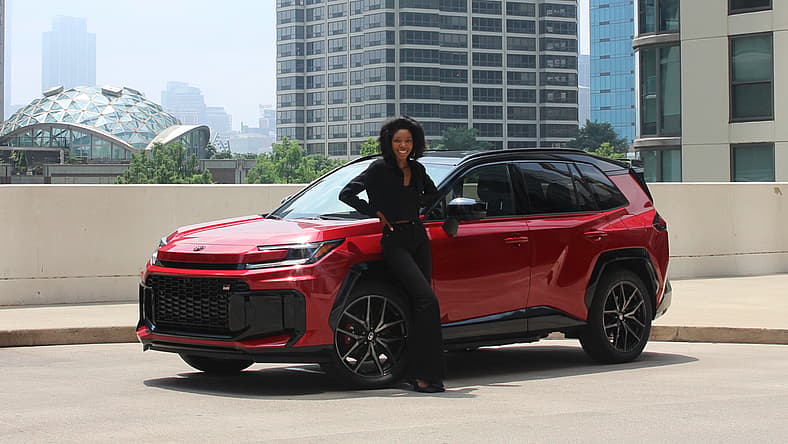 Corliss Standing With The 2026 Toyota Rav4 Gr Sport Phev