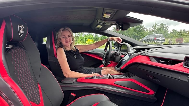 14 Sexy Sports Cars That Will Make You want to Drive 2 The Author In The Driver'S Seat Of The Lamborghini Revuelto