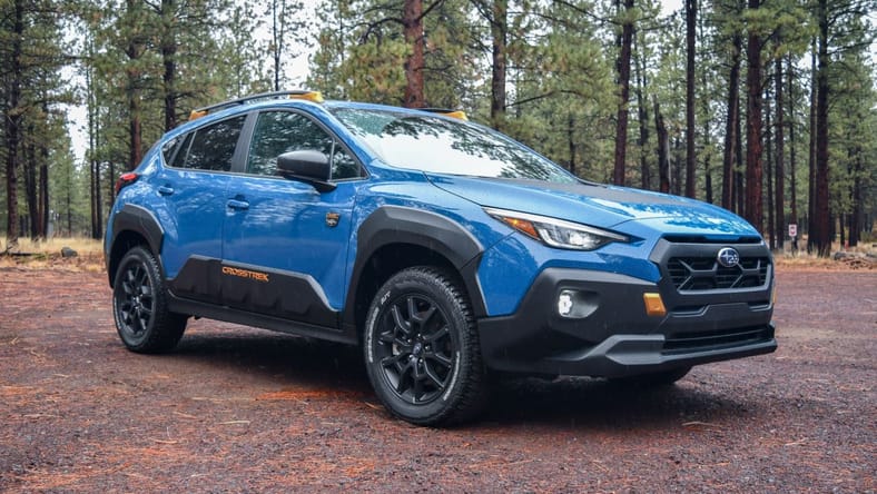 10 Things My Family Loved About the 2024 Subaru Crosstrek Wilderness 2 The 2024 Subaru Crosstrek Wilderness Parked On A Rainy, Dirt Road