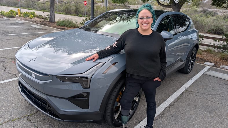Liv Leigh Standing Next To A Polestar 3