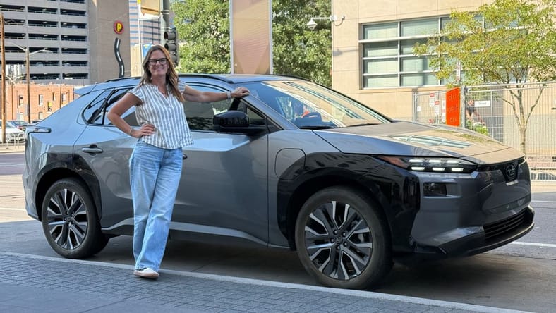 Sara Lacey Standing Next To The 2026 Subaru Solterra