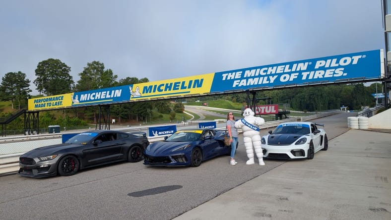 Me Standing Next To Bib The Michelin Tires Man In The Pit Lanes Of Michelin Roadway Atlanta
