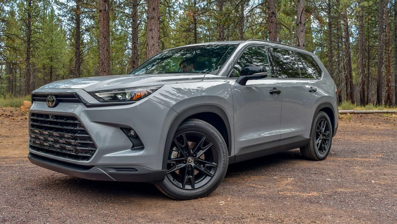 The Front End Quarter Of The 2025 Toyota Grand Highlander Nightshade Hybrid