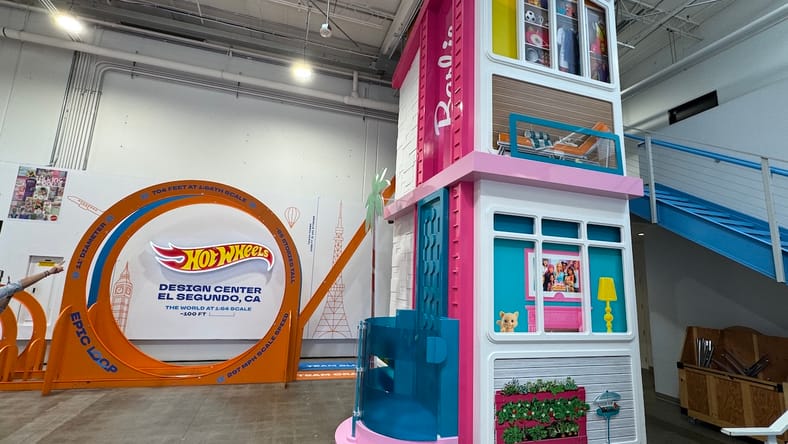 The Lobby In The Mattel Design Center Features A Super-Size Hot Wheels Track And An Elevator Bank Dressed Up As The Barbie Dream House