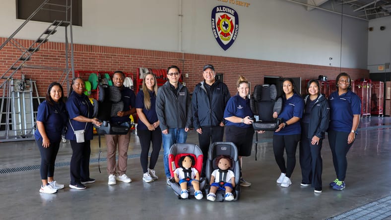 The Crew At The Aldine Fire And Rescue In Houston That Helped Educate Visitors On How To Install Car Seats Safely, And Handed Out Free Car Seats As Part Of The Hyundai Hopes And Genesis Gives Events
