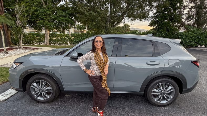 My Mom Standing Next To Her New Acura Adx, Which She Was Inspired To Buy Because Of Our Reviews