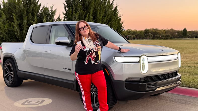 Natalie Merola Standing With The 2026 Rivian R1T Quad Motor