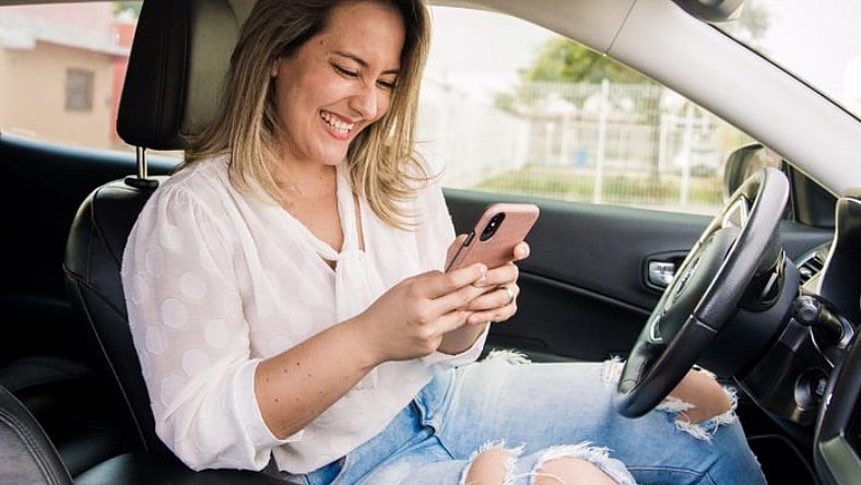 Woman Looking At Phone