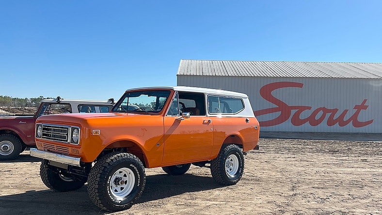 A Heritage Scout Stands On The Building Site Of The New Assembly Plant.