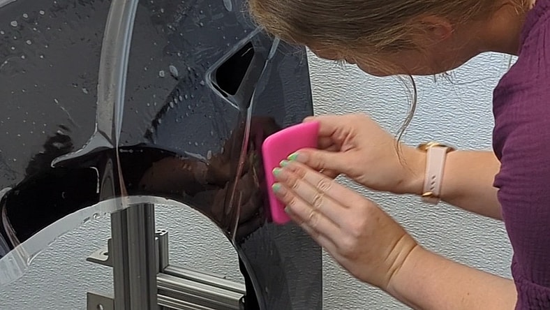 Annika Carter Applying Paint Protection Film At The Xpel Lab