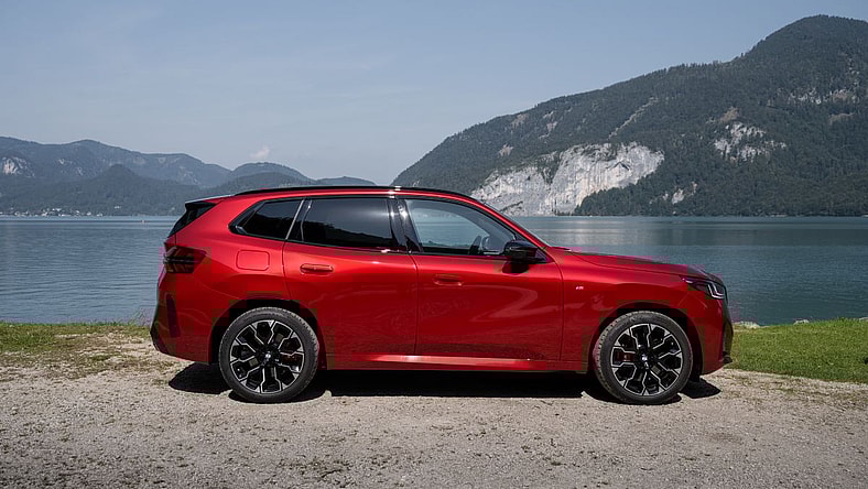 The All New 2025 Bmw X3 M50 Parked Near A Scenic Lake