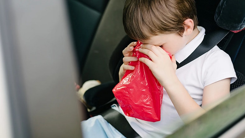 Car Sick Child Clean Puke Out Of A Car