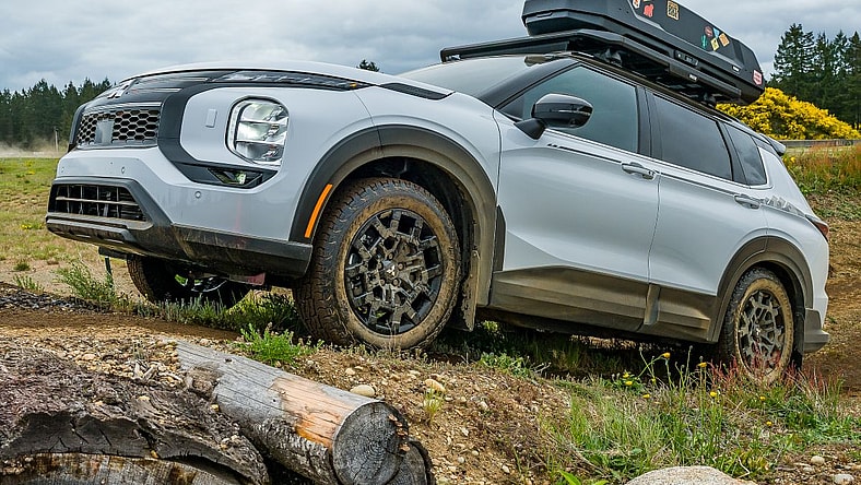 The 2025 Mitsubishi Outlander Trail Edition Climbing A Muddy Hill