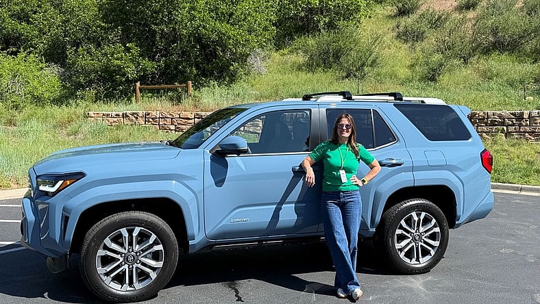 Standing In Front Of The 2025 Toyota 4Wd Suv 4Runner