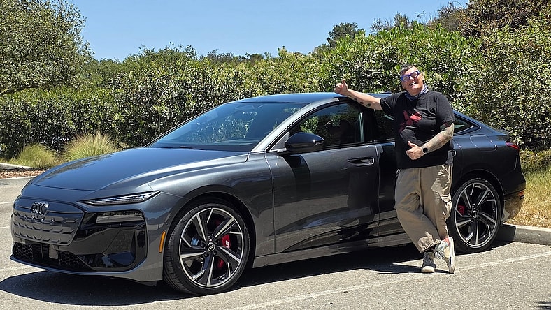 Myriam Joire With The Audi S6 E-Tron Sportback Sedan