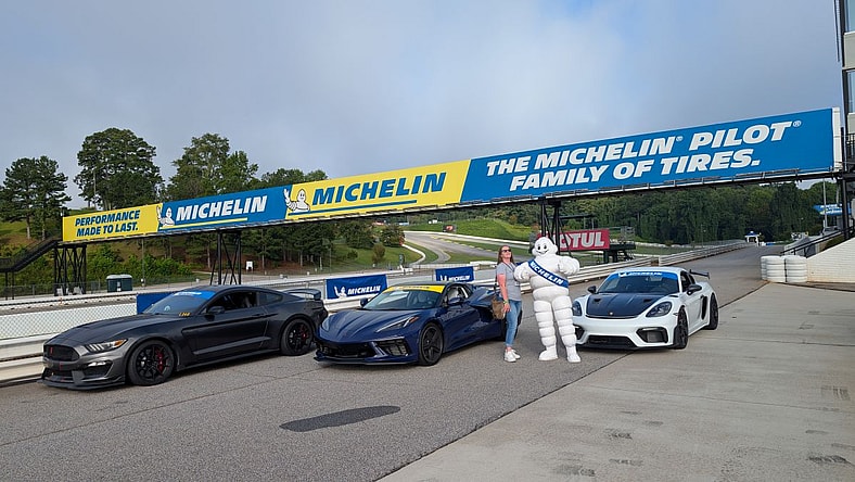 Me Standing Next To Bib The Michelin Tires Man In The Pit Lanes Of Michelin Roadway Atlanta