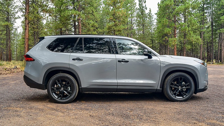 The Side Profile Of The 2025 Toyota Grand Highlander Nightshade Hybrid