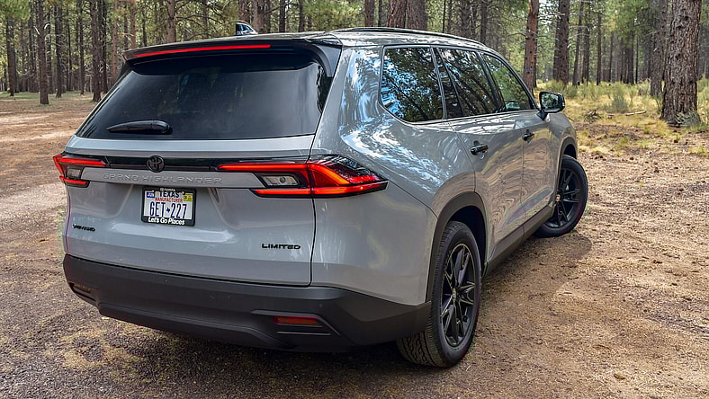The Rear Quarter Of The 2025 Toyota Grand Highlander Nightshade Hybrid