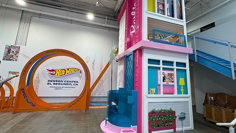 The Lobby In The Mattel Design Center Features A Super-Size Hot Wheels Track And An Elevator Bank Dressed Up As The Barbie Dream House