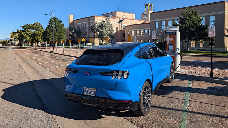 An Ev Charging At A Public Charging Station
