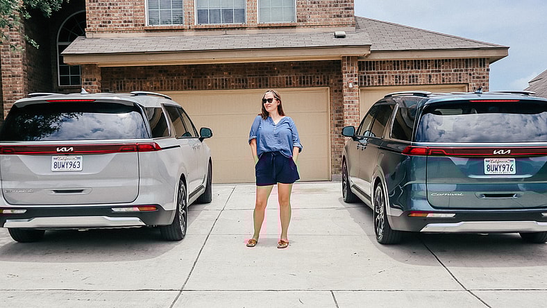 Me Standing With Both Of Our Minivans