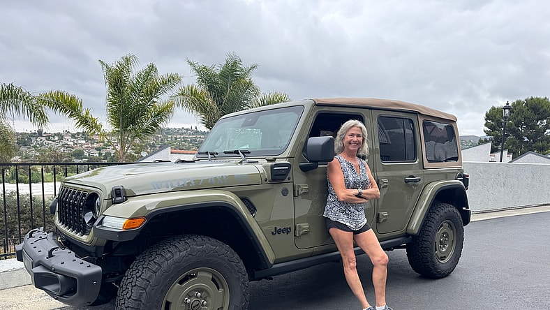Kymri Wilt Standing With The 2025 Jeep Wrangler 4Xe Willys
