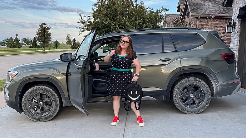 Natalie Merola Standing With The Vw Atlas Peak Edition