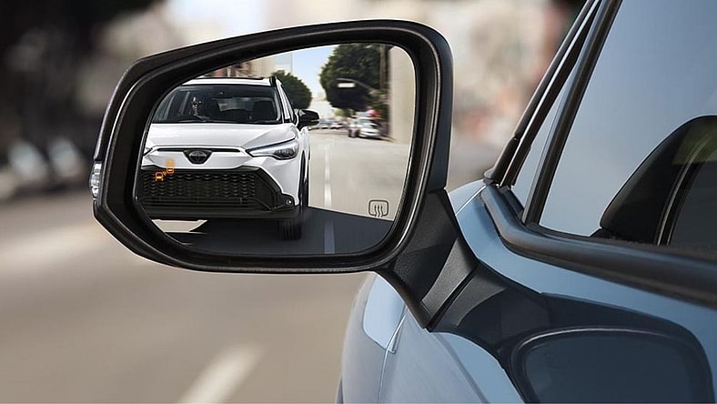 A Car Following Behind Another Car, Indicating Someone May Be Stalking Or Following The Lead Car With Bad Intentions