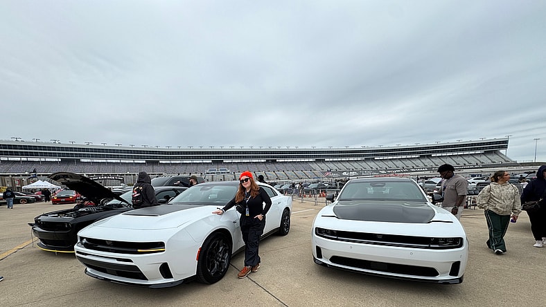 Natalie Standing With A Few Dodge Charger Sixpacks During Mopar Heaven