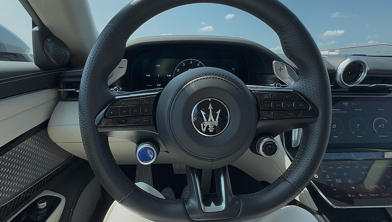 The View From The Driver'S Seat In The Maserati Granturismo