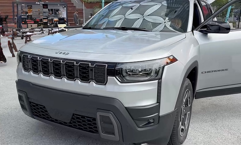 The 2026 Jeep Cherokee Maintains The Classic Sarge Grille But Adds New Lights And Looks