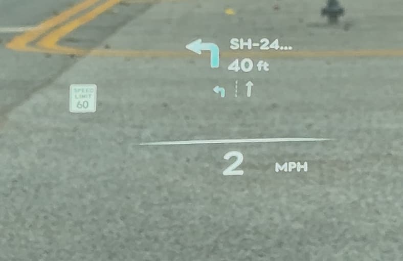 2026 Genesis GV70: Subtle Design Changes and a Big Tech Upgrade Enhance This SUV's Luxury 6 Head Up Display Projects Apple Maps Navigation In The 2026 Genesis Gv70