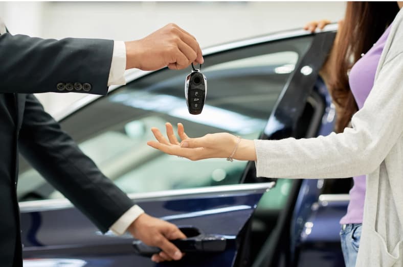These Are the 15 Most Negotiable New Cars on Dealers Lots Right Now. Get 'Em While You Can 2 Most Negotiable New Cars Woman At A Car Dealership