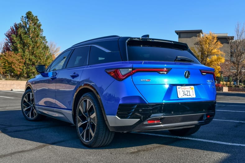 A 2024 Acura ZDX Type S parked, showing the rear left taillight 