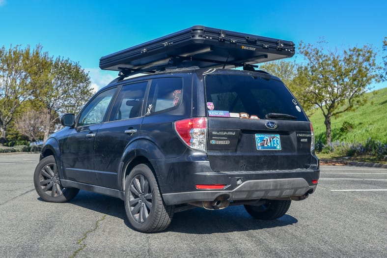 A Rear View Of My Subaru With A Rooftop Tent On It