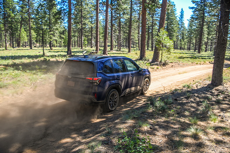 Both the 2025 Toyota RAV4 and Subaru Forester Hybrid Are Winners. But One is a Champ. 5 The Rear End Of The Subaru Forester Hybrid Off-Road