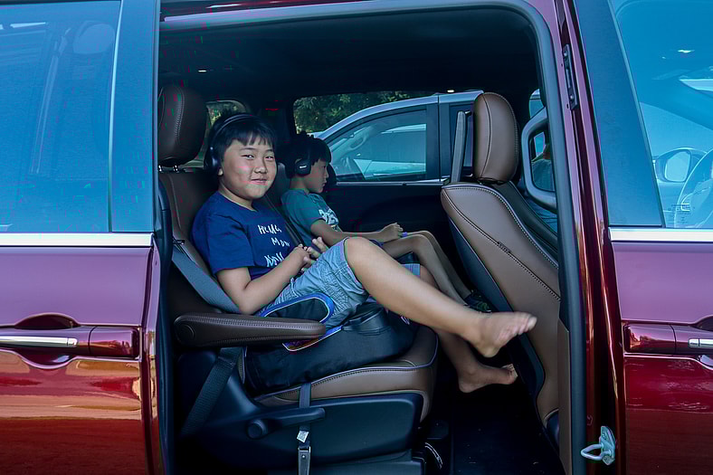 My Two Sons Sitting In A Minivan I Reviewed