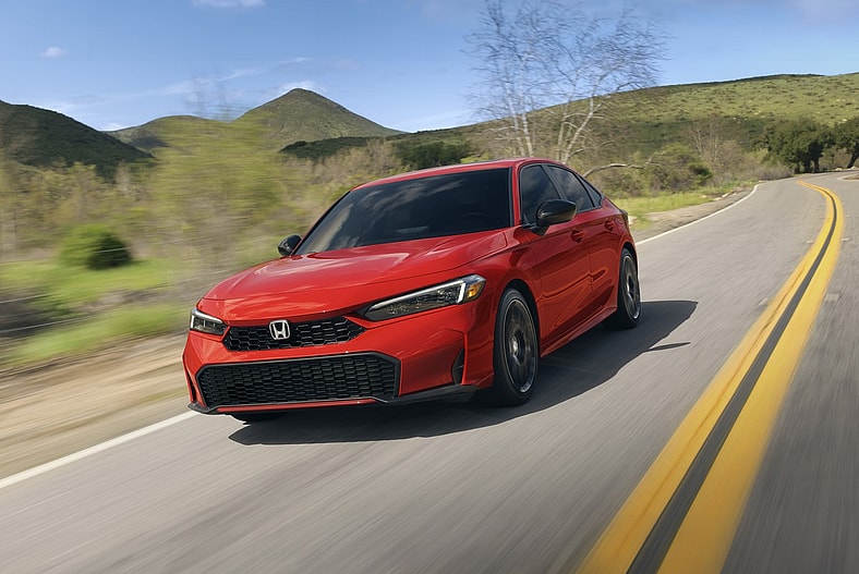 The Front End Of The 2025 Honda Civic Sport Touring Hybrid Among The Best Hybrid Cars 