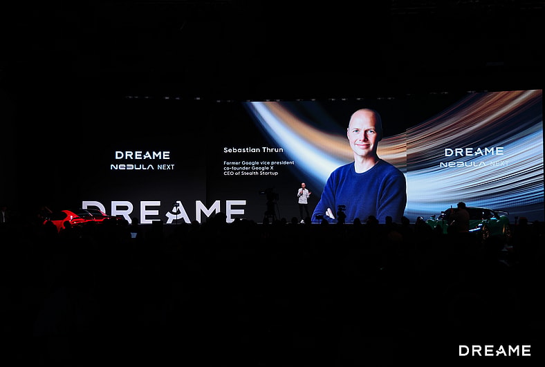Sebastian Thrun Speaking On Stage About Ai, Self-Driving, And His Involvement With The Next 01 Jet Edition