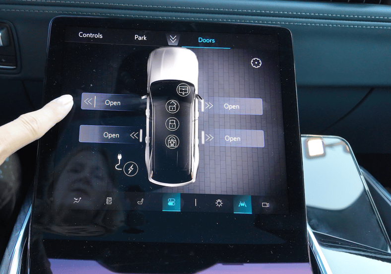 Buttons On The Command Screen In The Cadillac Escalade Iq Will Open Or Close The Doors For You