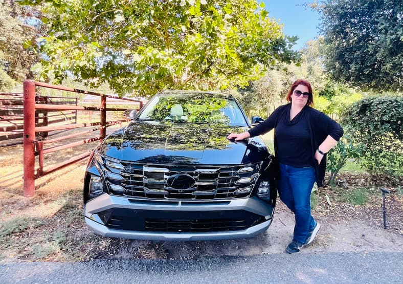 New Or Used? The Best Hybrid SUVs and What They Cost New and Used 9 Tanya Gazdik With The 2025 Hyundai Tucson