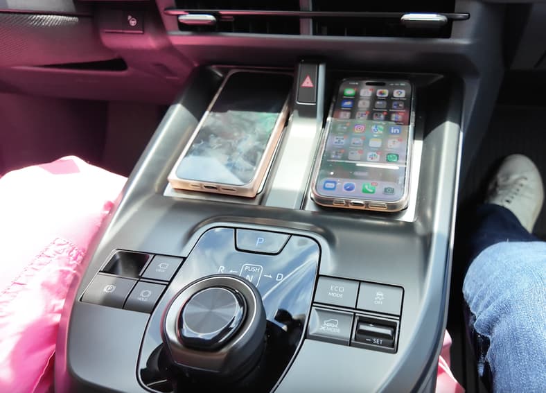 The 2026 Toyota Bz Center Console With A New Push:dial Gear Selector And Dual Wireless Charge Pads