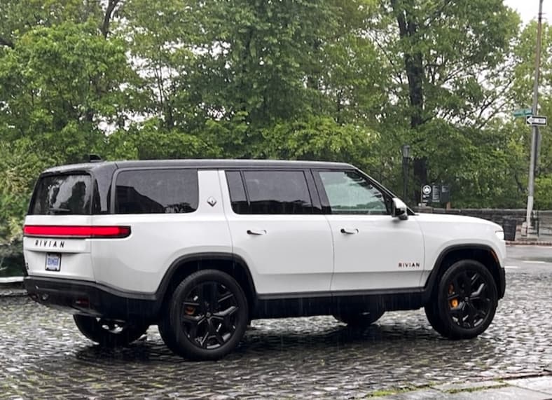 Think Car Shopping Is Boring, or Scary? Rivian Just Reinvented the Showroom and Test Drive 7 The R1S Looks Right At Home Against The Historic Backdrop Of The Cloisters - Proving Electric Vehicles Can Handle Any Adventure, Rain Or Shine