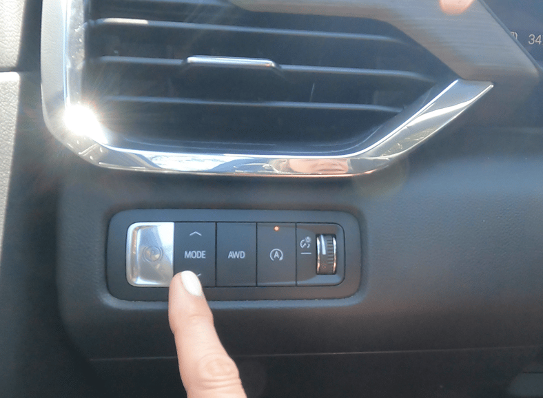 Drive Mode Selector And Awd On:off Buttons Are To The Left Of The Steering Wheel In The 2024 Gmc Acadia