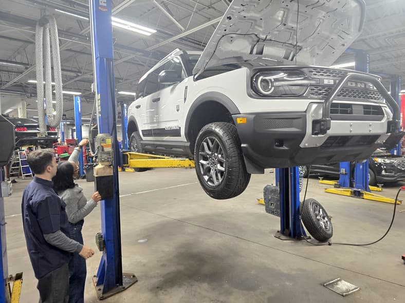 Lifting Up A Car To Perform An Mpi