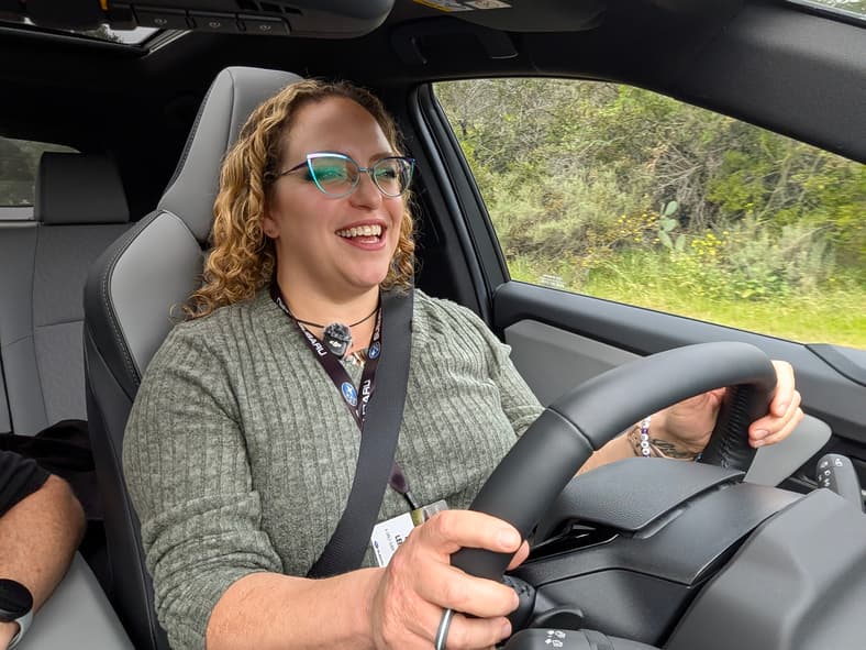 Liv Smiling While Driving The Subaru Uncharted